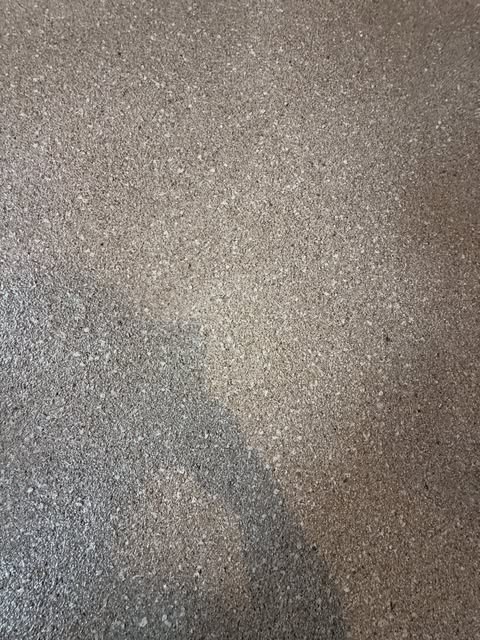 Close-up of grey and black epoxy flake blend with clear topcoat