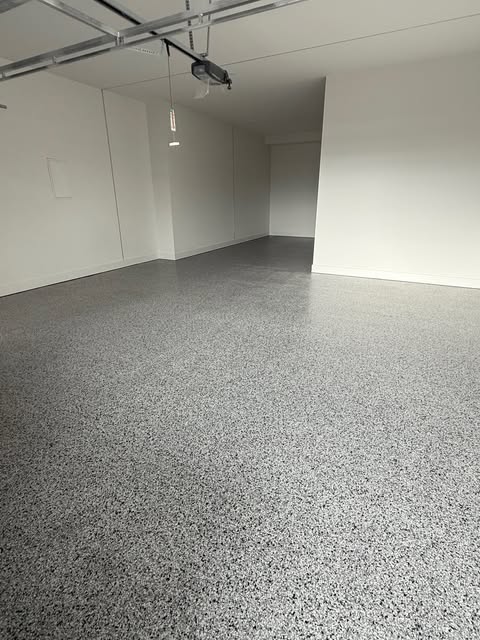 Grey epoxy flake floor in a double garage in Melbourne, finished by CR&S