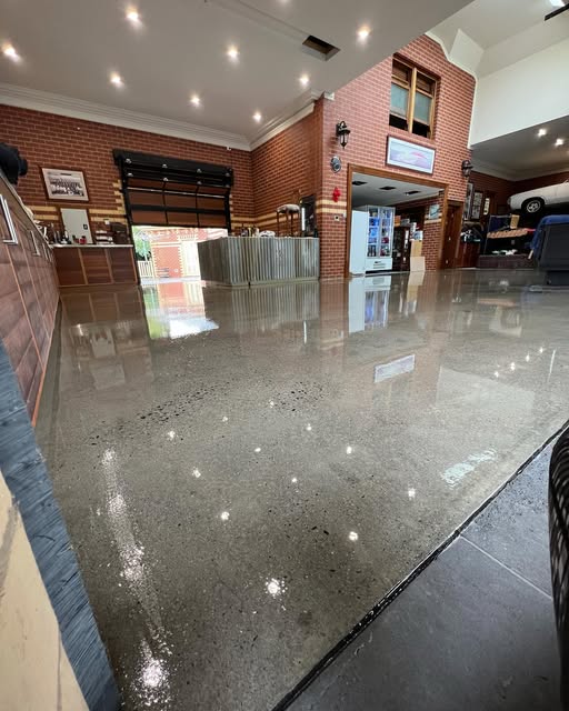 Freshly cleaned and sealed polished concrete floor in a Melbourne showroom
